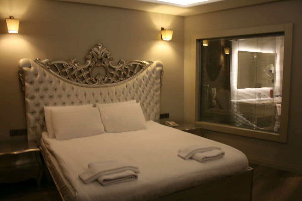 אורטקנט Temenos Luxury Suites Hotel & Spa חדר תמונה